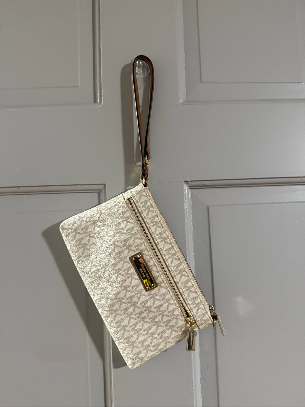 Michael Kors Cream Logo Wristlet with Gold Hardware